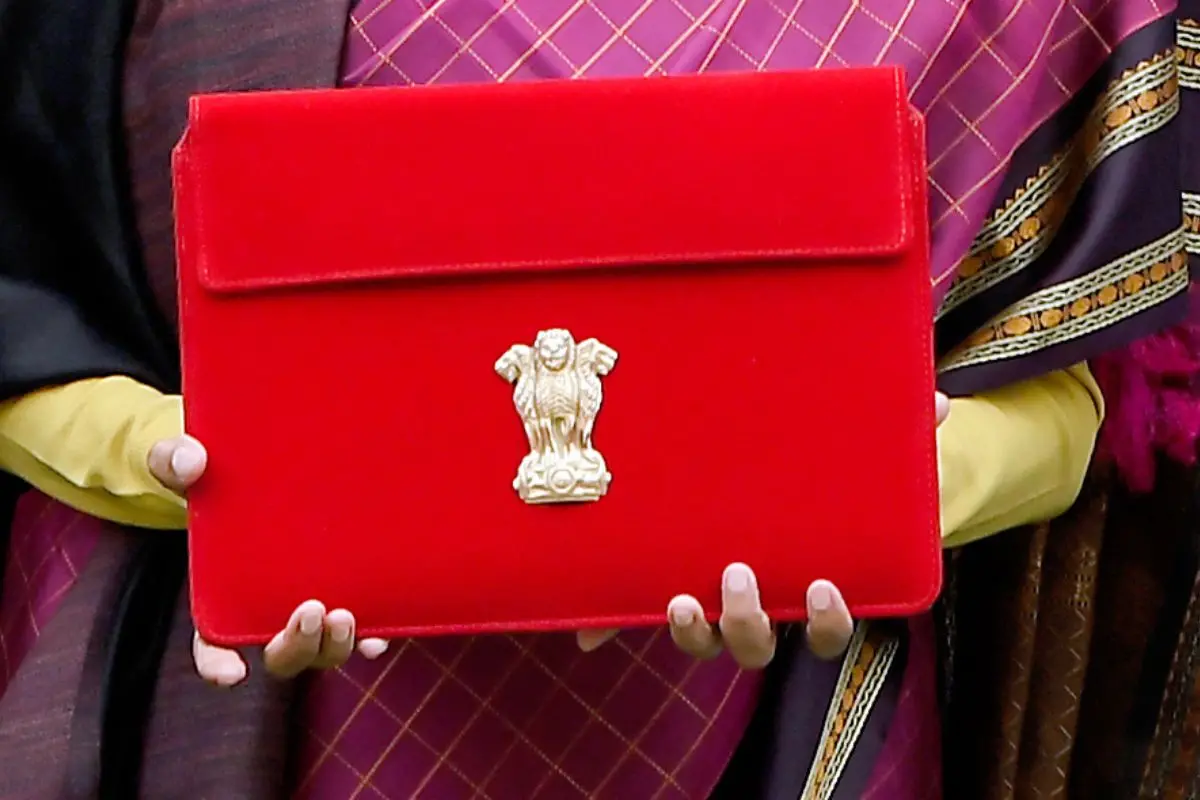 Union Finance Minister Nirmala Sitharaman shows the budget tablet as she arrives at the Parliament House to present the Union Budget 2026, in New Delhi on Sunday. (ANI Photo/Rahul Singh)