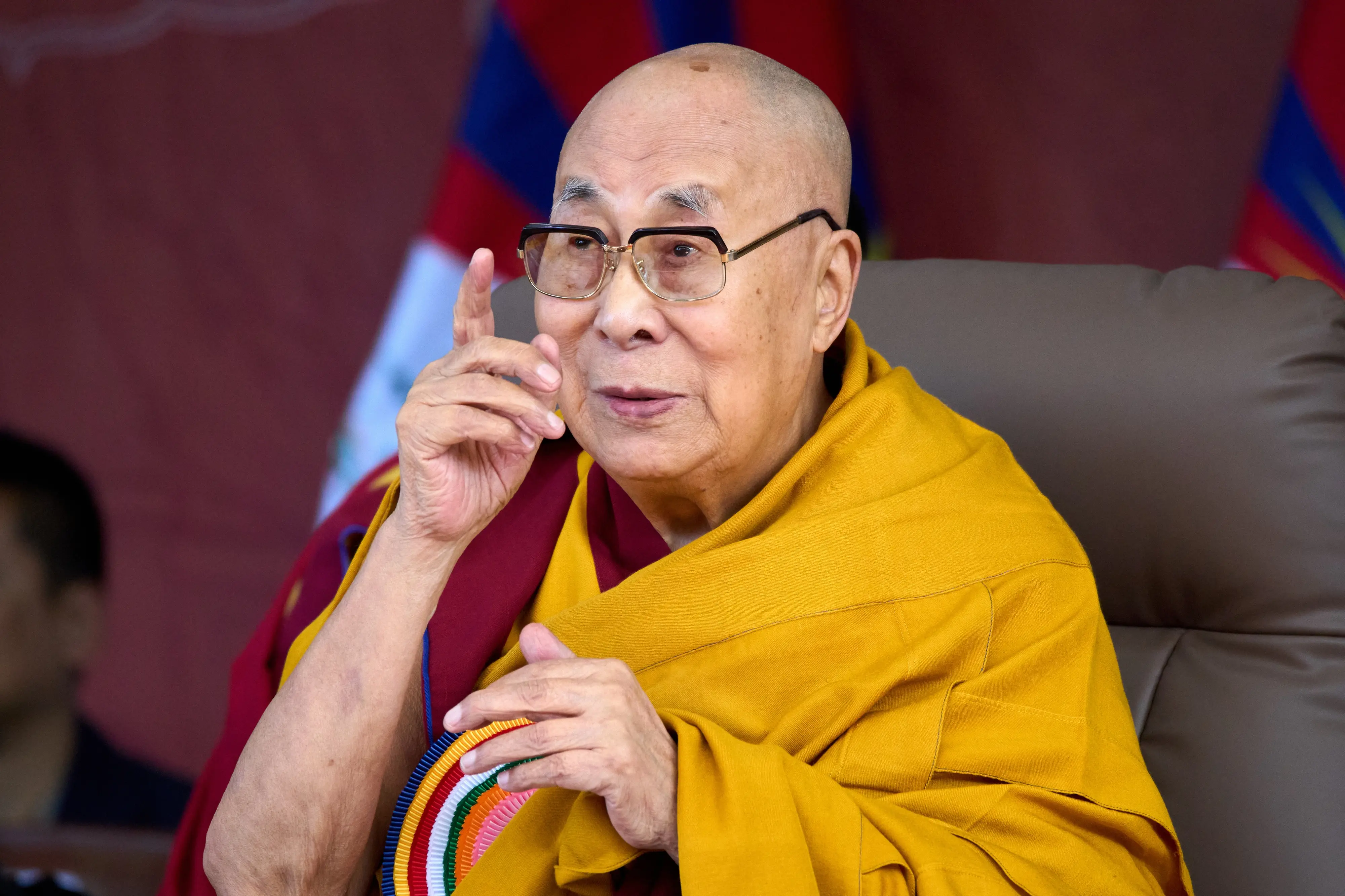 Tibetan spiritual leader the Dalai Lama gestures during an event | File photo: AP