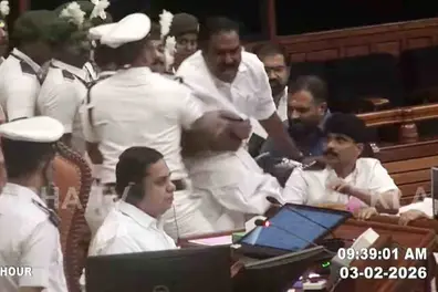 Protests, war of words in Kerala Assembly; UDF MLA attempts to jump onto dais, Speaker walks out