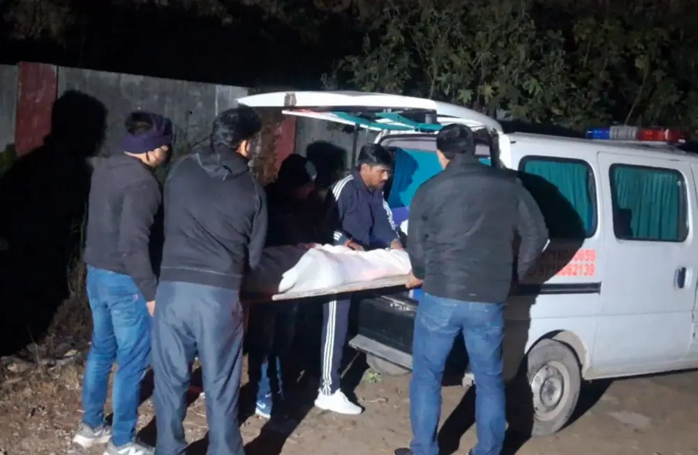 Mortal remains of the three minor sisters, who died after allegedly jumping off the balcony of their ninth floor home, being carried after post-mortem procedure, in Ghaziabad | PTI