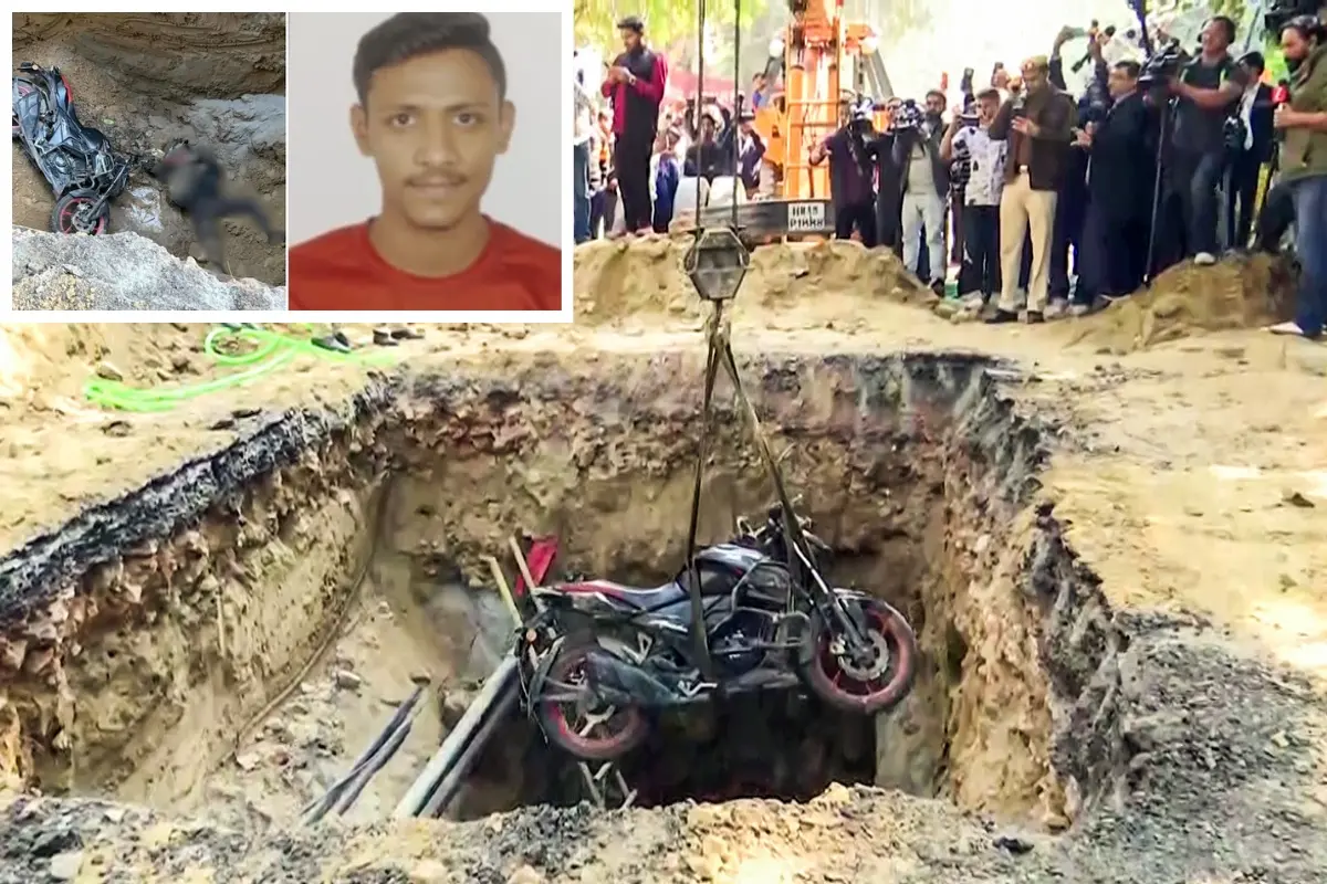A visual of late Kamal Dhyani's bike being recovered from the pit in Janakpuri, New Delhi.| Photo: PTI