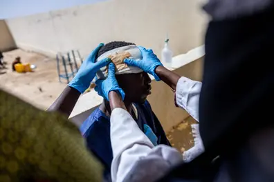 Why are displaced families in Sudan being targeted amid worsening humanitarian crises?