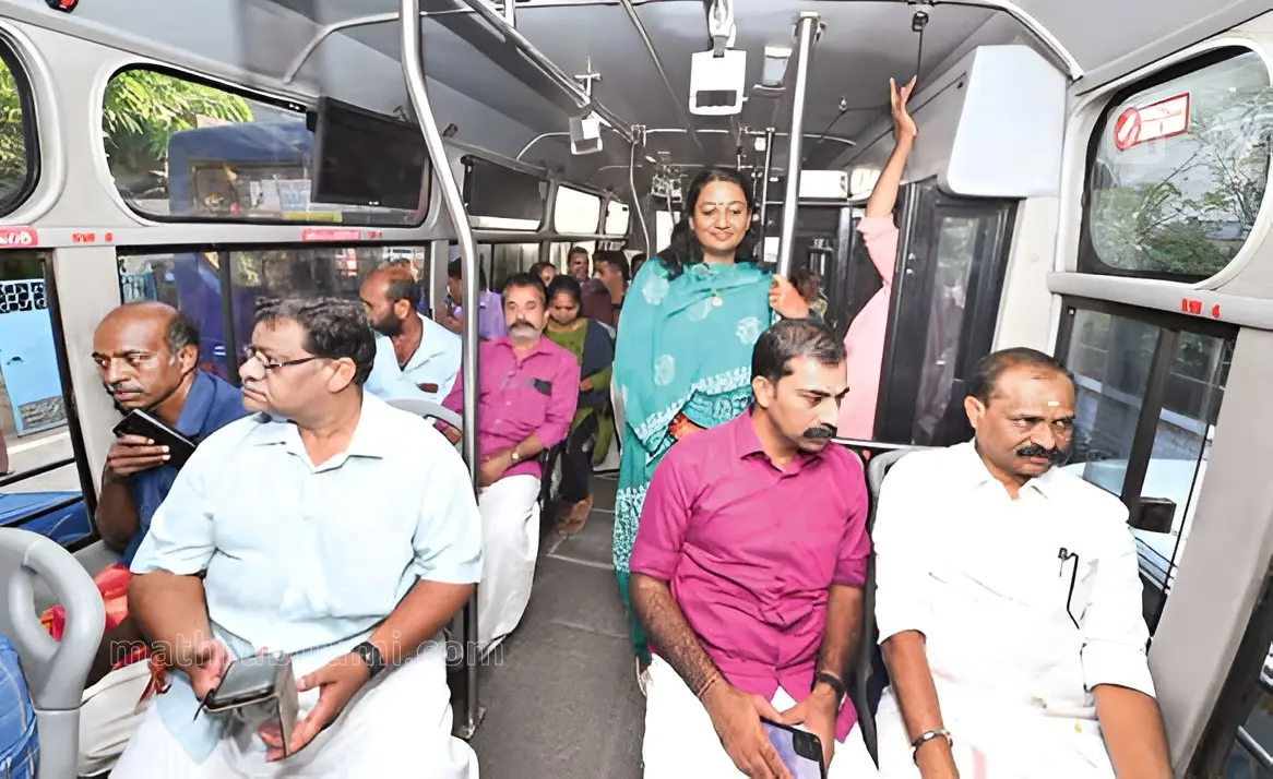 Mayor V V Rajesh and officials travel on the city's electric bus after its flag-off