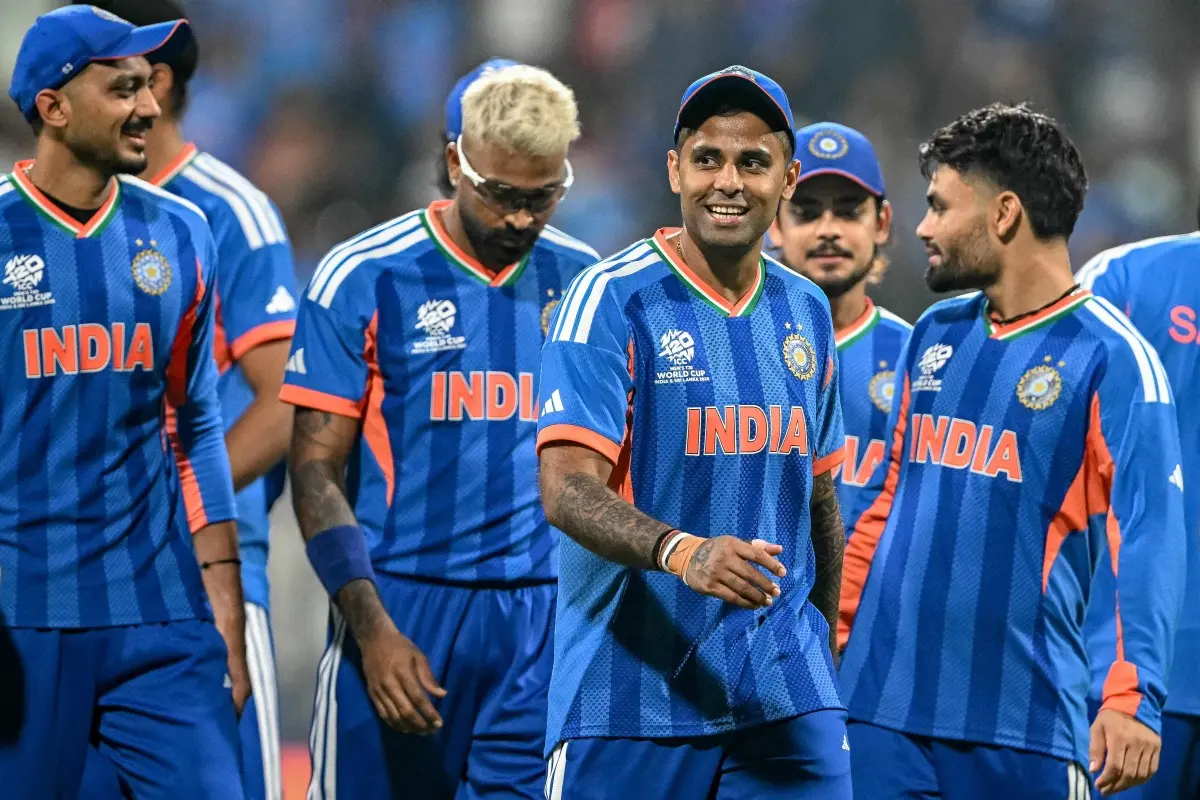 India's captain Suryakumar Yadav (C) and his teammates walk off the field after winning the 2026 ICC Men's T20 Cricket World Cup group stage match against USA at the Wankhede Stadium in Mumbai. | Photo: AFP