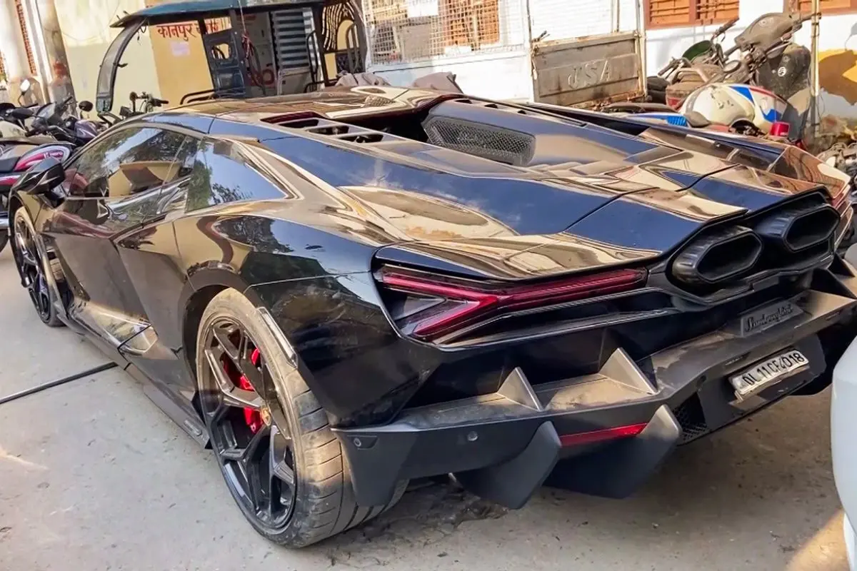 A view of a damaged Lamborghini car seized by the Gwaltoli police station. (ANI Video Grab)