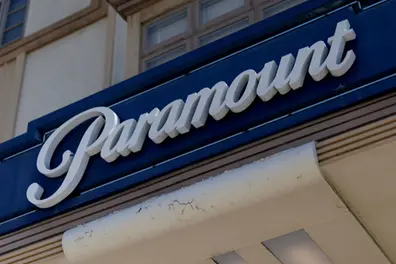Paramount ups bid for Warner Bros. Discovery with 25-cent ticking fee amid Netflix battle