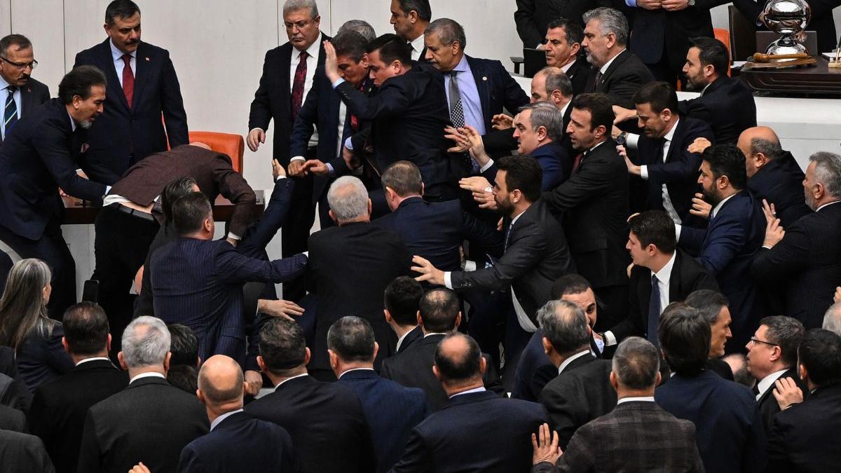 Turkish Parliament explodes into chaos as lawmakers trade punches in justice minister showdown