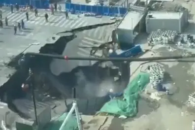 Shanghai road swallowed by giant sinkhole, CCTV captures shocking collapse | WATCH
