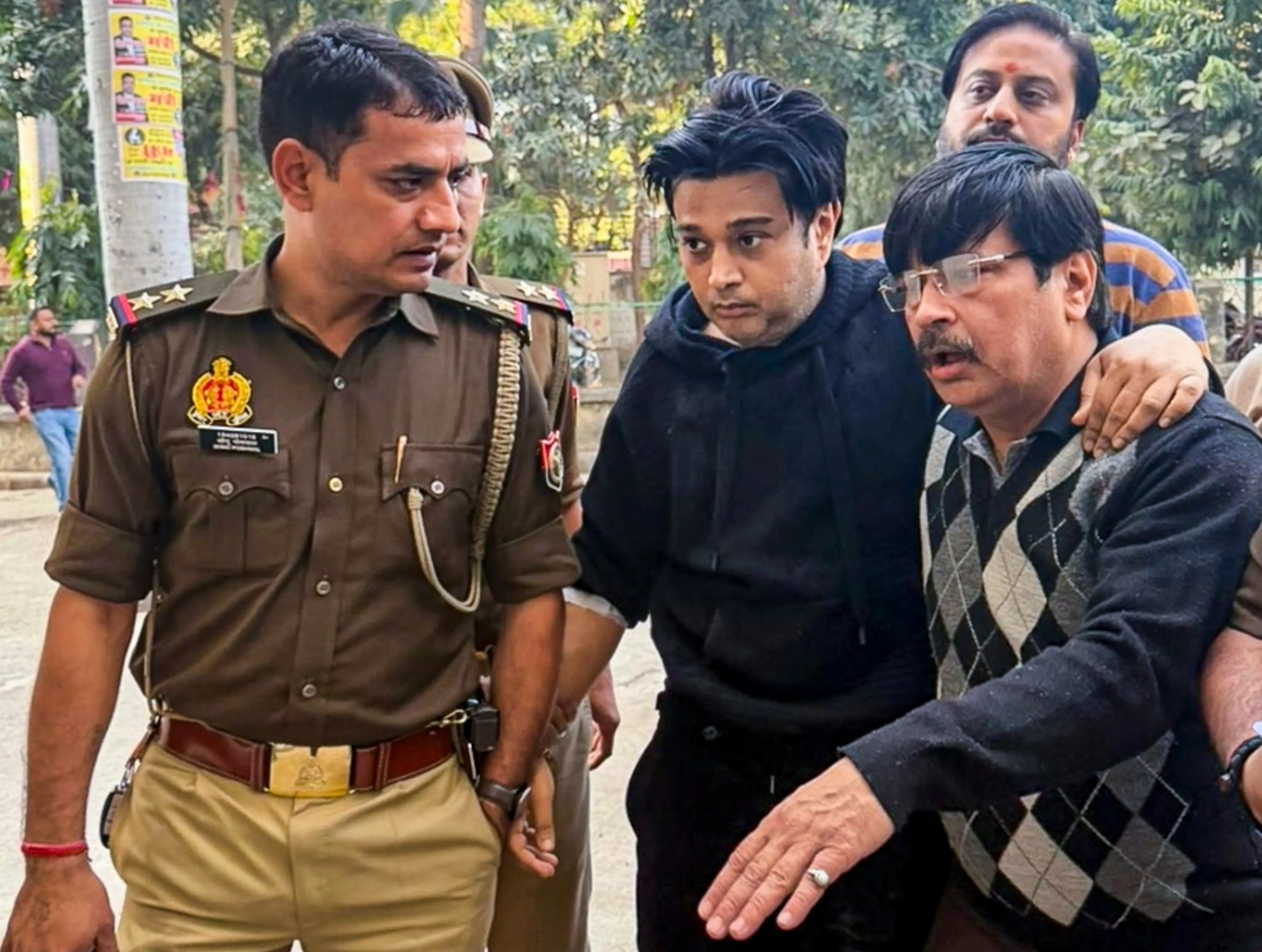 Shivam Mishra, centre, son of local tobacco baron K K Mishra, being produced at a court after his arrest in connection with the high-profile Lamborghini crash | PTI