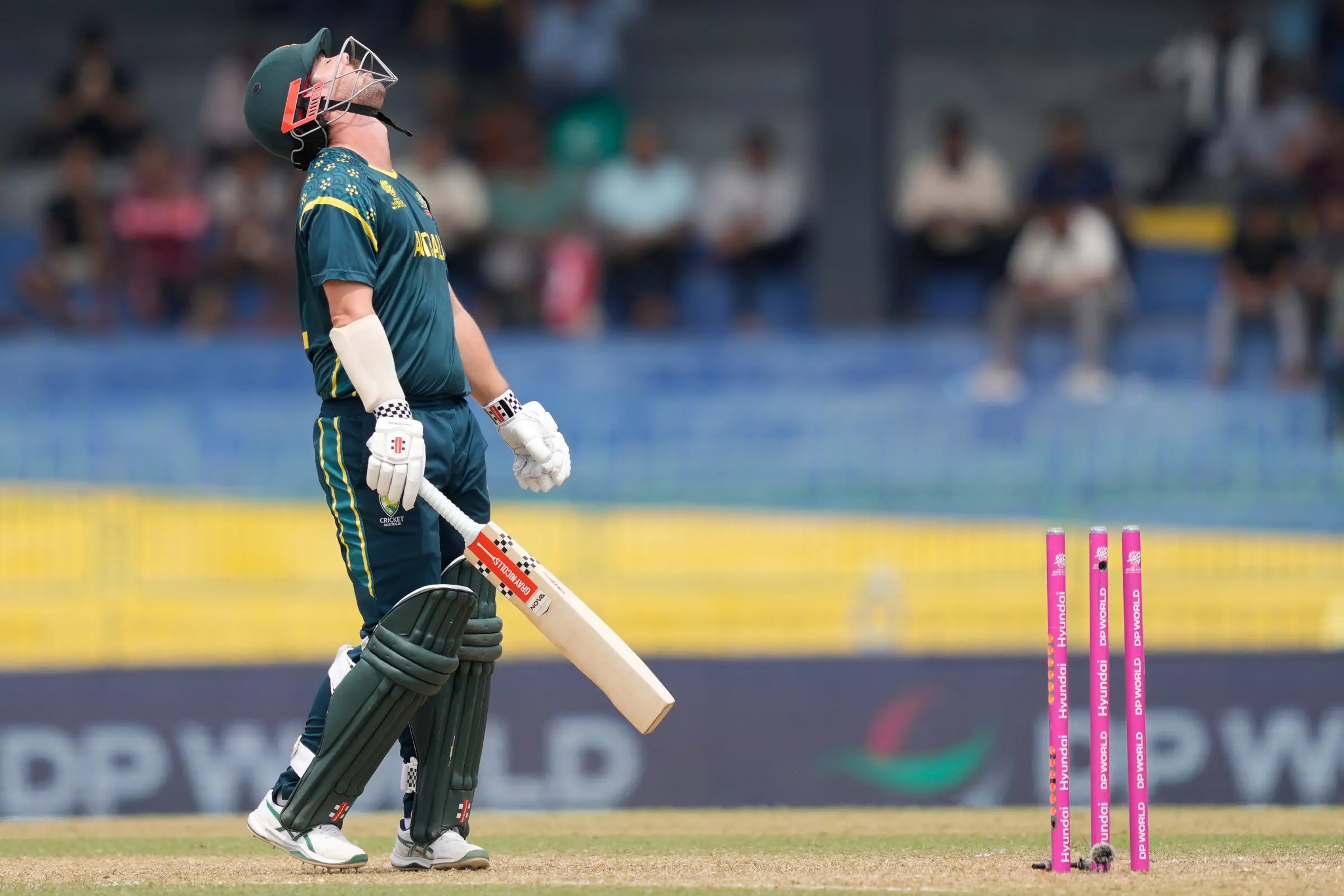 Australia's captain Travis Head reacts after loosing his wicket during the T20 World Cup cricket match between Australia and Zimbabwe in Colombo, Sri Lanka | Photo: AP