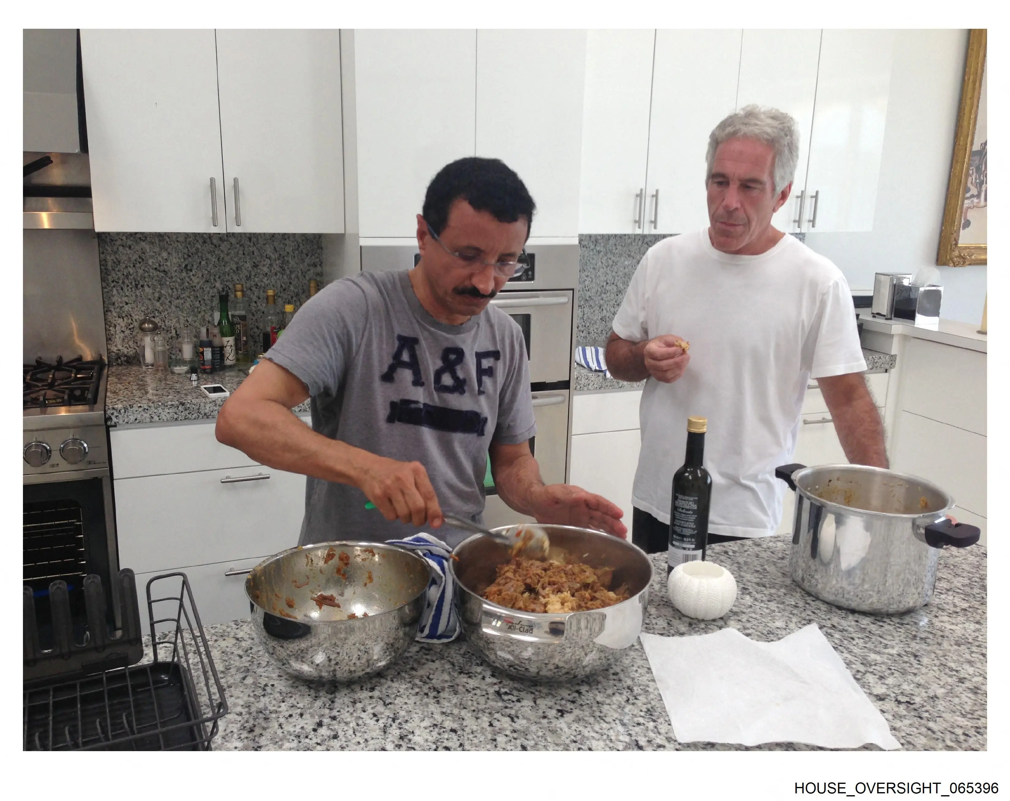 Late convicted sex offender Jeffrey Epstein (R) cooking with CEO of DP World Sultan Ahmed bin Sulayem | Credit: AFP PHOTO /  HOUSE OVERSIGHT COMMITTEE DEMOCRATS