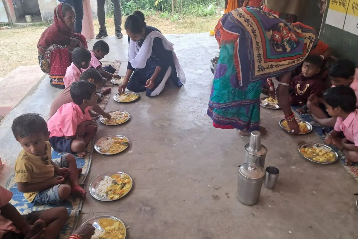 Children having a meal at the Nuagaon Anganwadi | Photo: X/@PandaJay