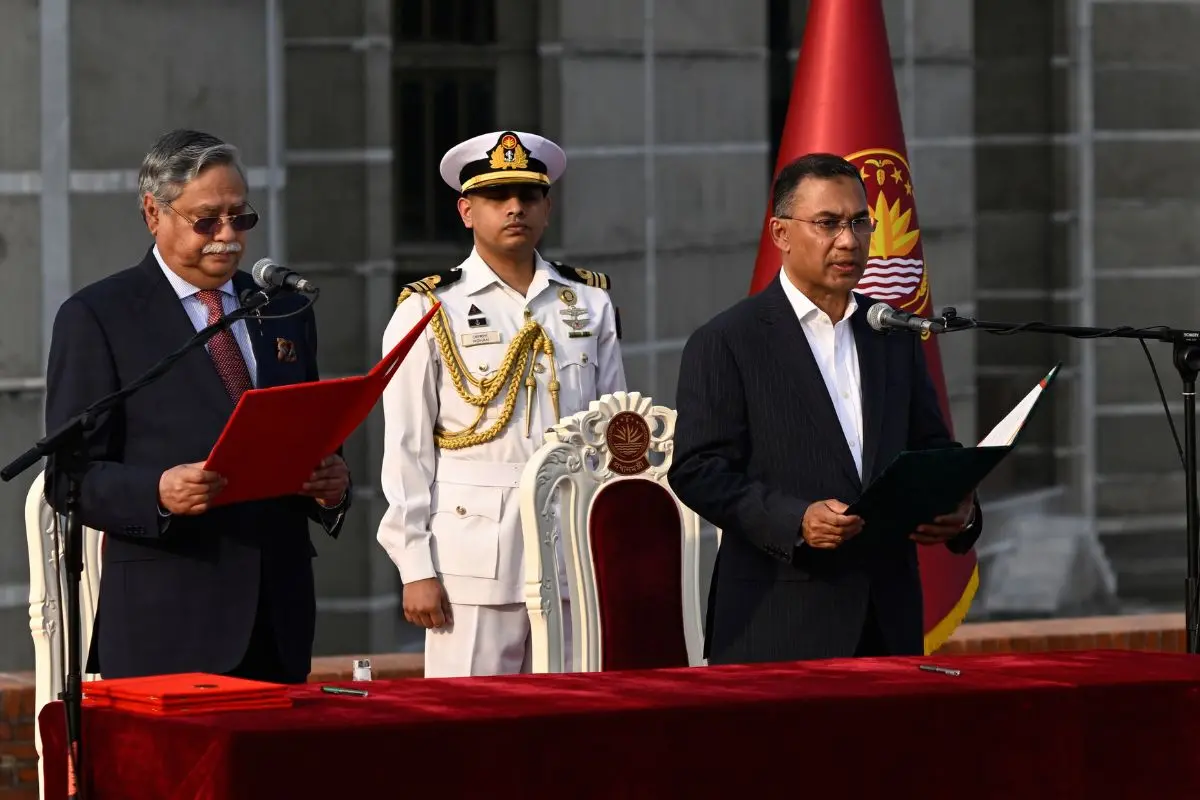 Tarique Rahman, Chairperson of the Bangladesh Nationalist Party, takes oath as Prime Minister of Bangladesh from President Mohammed Shahabuddin, left, at the National Parliament in Dhaka, Bangladesh, Tuesday, Feb. 17, 2026. (AP Photo/Mahmud Hossain Opu)
