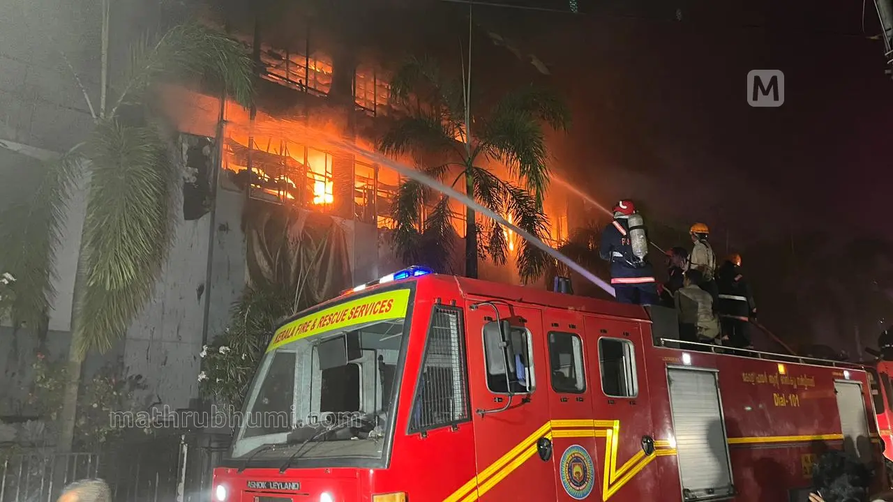 irefighters trying to extinguish a fire at the clothing store in Kozhikode | Photo: Shaheer C H
