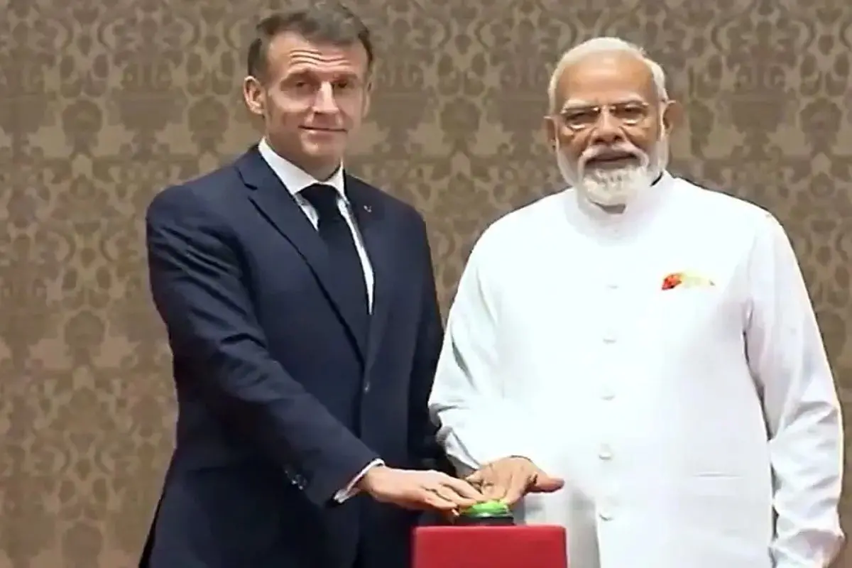 Prime Minister Narendra Modi (Right) and French President Emmanuel Macron virtually inaugurate the Final Assembly Line (FAL) for Airbus H125 helicopters at Vemagal Industrial Area in Kolar, Karnataka. Photo: ANI Screengrab