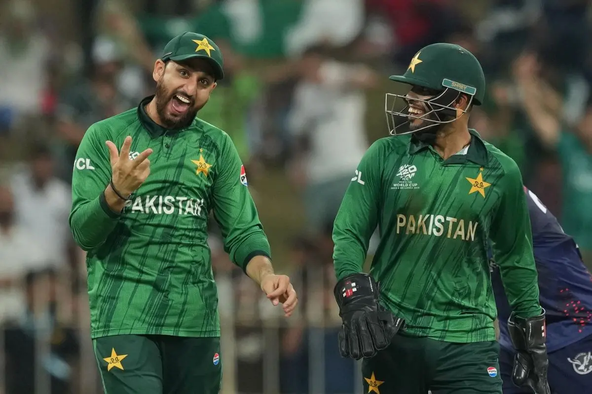 Pakistan's captain Salman Ali Agha, left, celebrates with Usman Khan after winning T20 World Cup cricket match against Namibia. AP/PTI
