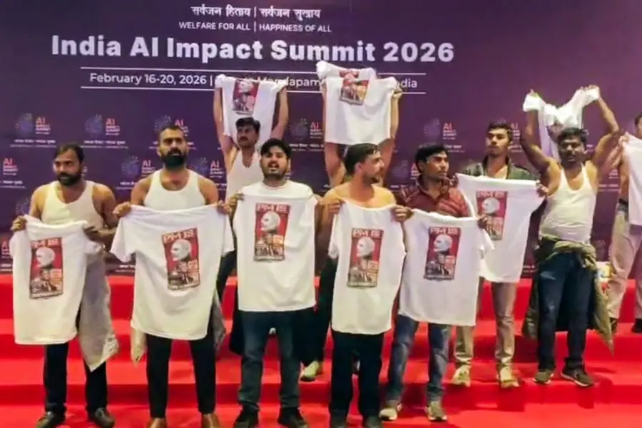 Indian Youth Congress workers stage a protest at Bharat Mandapam during the India AI Impact Summit 2026