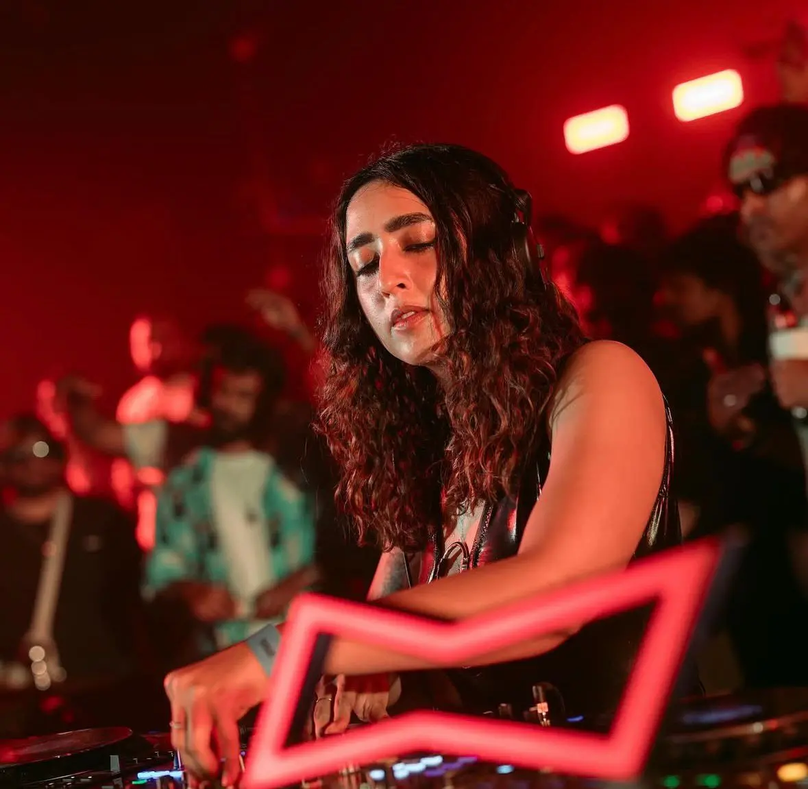 DJ Tasnneem grooving the crowd in one of her shows.