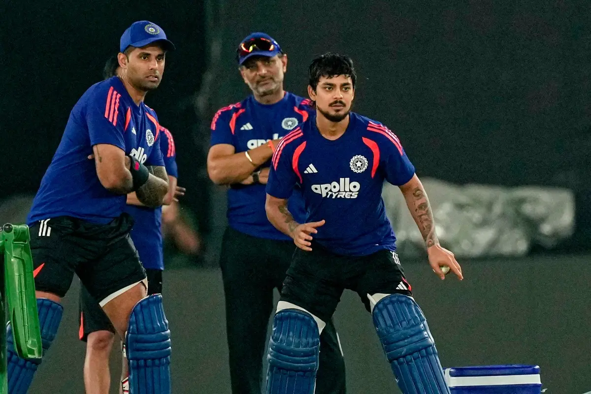 From left, India's captain Suryakumar Yadav, batting coach Sitanshu Kotak and Ishan Kishan during a practice session | Photo: PTI