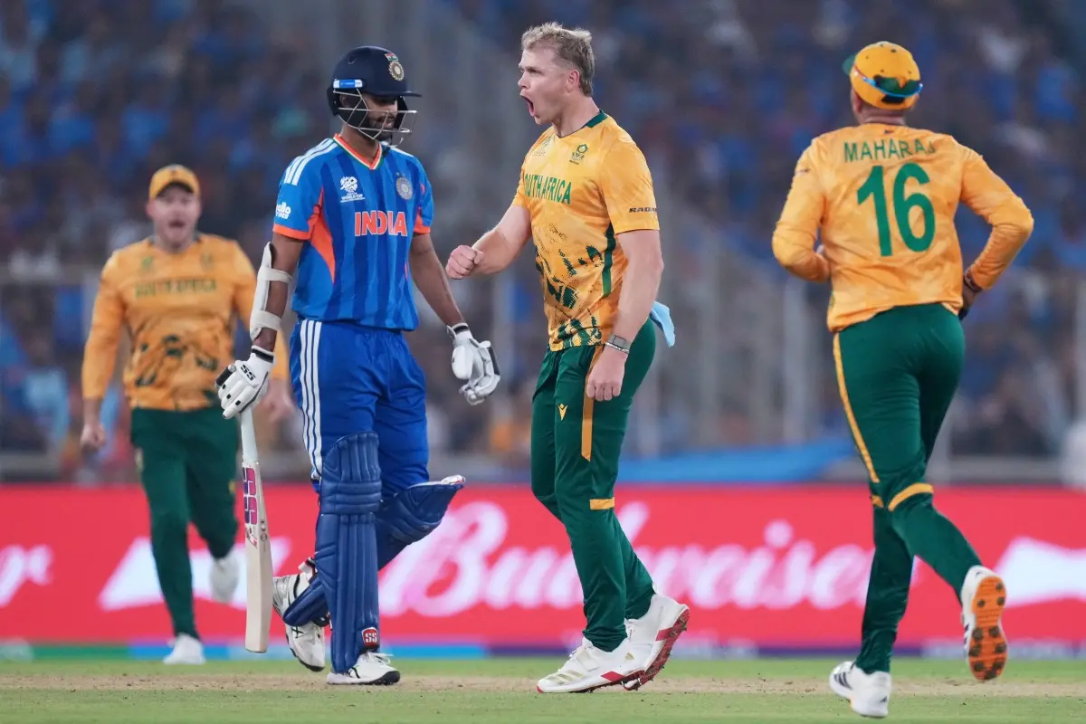 South Africa's Corbin Bosch, second right, celebrates with teammates the wicket of India's Washington Sundar, second left, during the T20 World Cup cricket match between India and South Africa in Ahmedabad. | Photo: AP