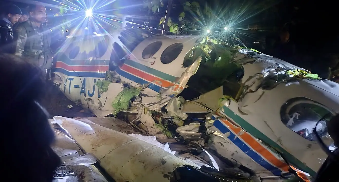 People gather near wreckage of an Redbird Airways Pvt Ltd Beechcraft C90 aircraft VT-AJV operating medical evacuation (Air Ambulance) flight | PTI
