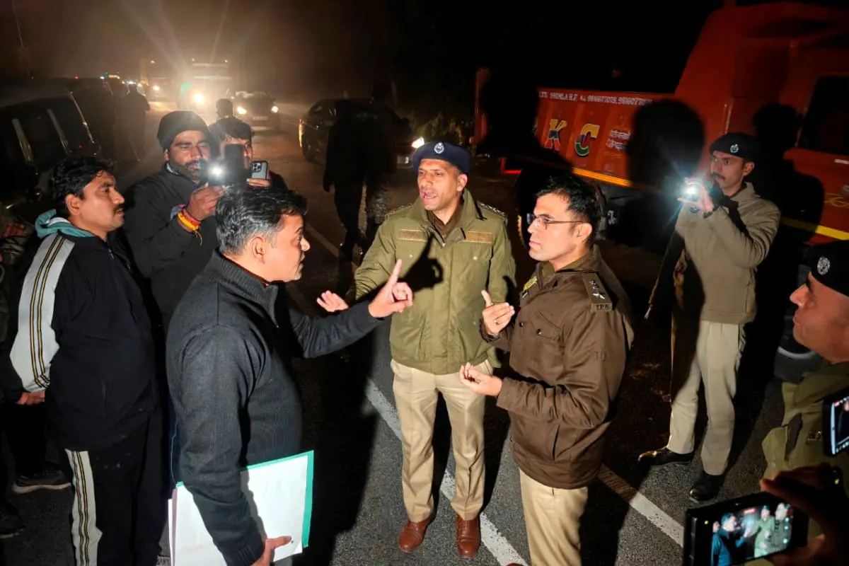 Police officials from Delhi and Shimla in a conversation, in Shimla, Wednesday, Feb. 25, 2026 (Photo: PTI)
