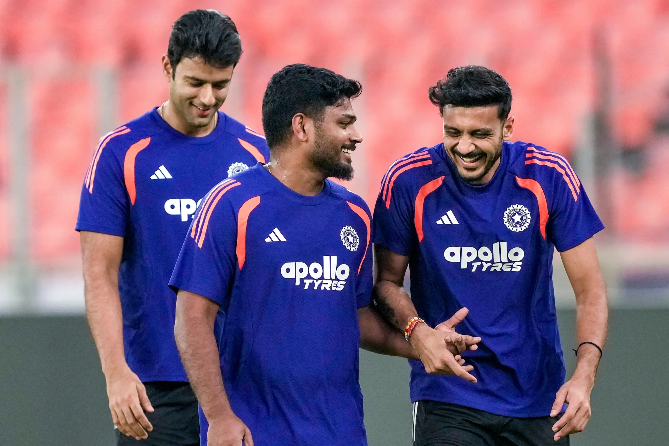 From left, India's Shivam Dube, Sanju Samson and Axar Patel during a practice session | Photo: PTI