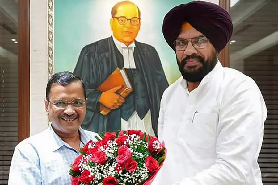 Arvind Kejriwal and Kuldeep Dhaliwal