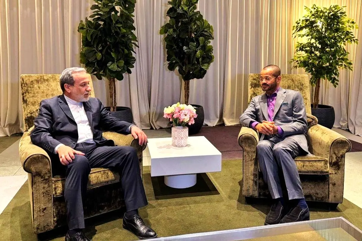 In this photo taken on Wednesday, Iran's Foreign Minister Seyyed Abbas Araghchi is seen with his Omani counterpart and mediator Seyyed Badr Al-Busaidi in Geneva