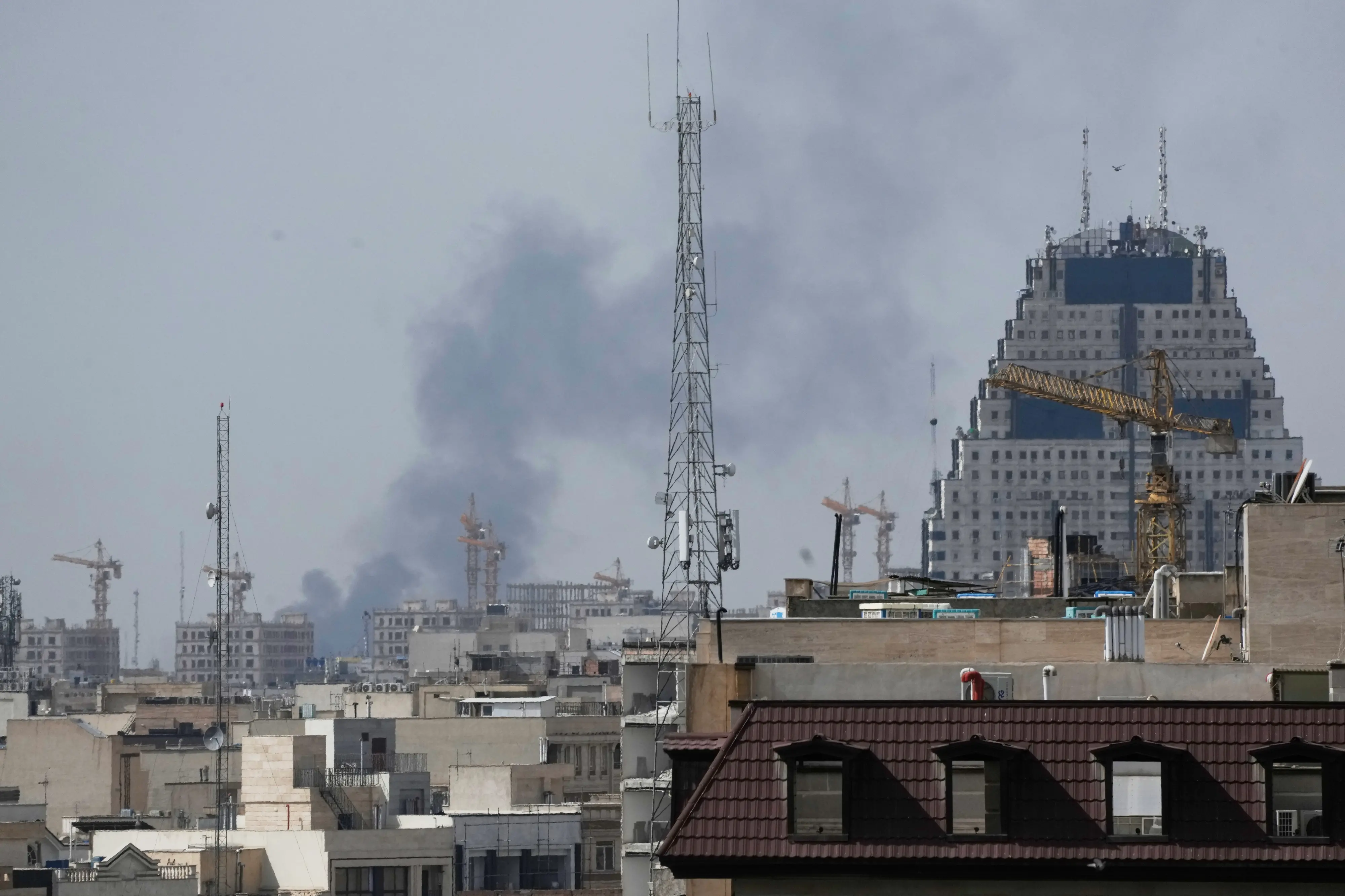 Smoke rises on the skyline after an explosion in Tehran | Photo: AP