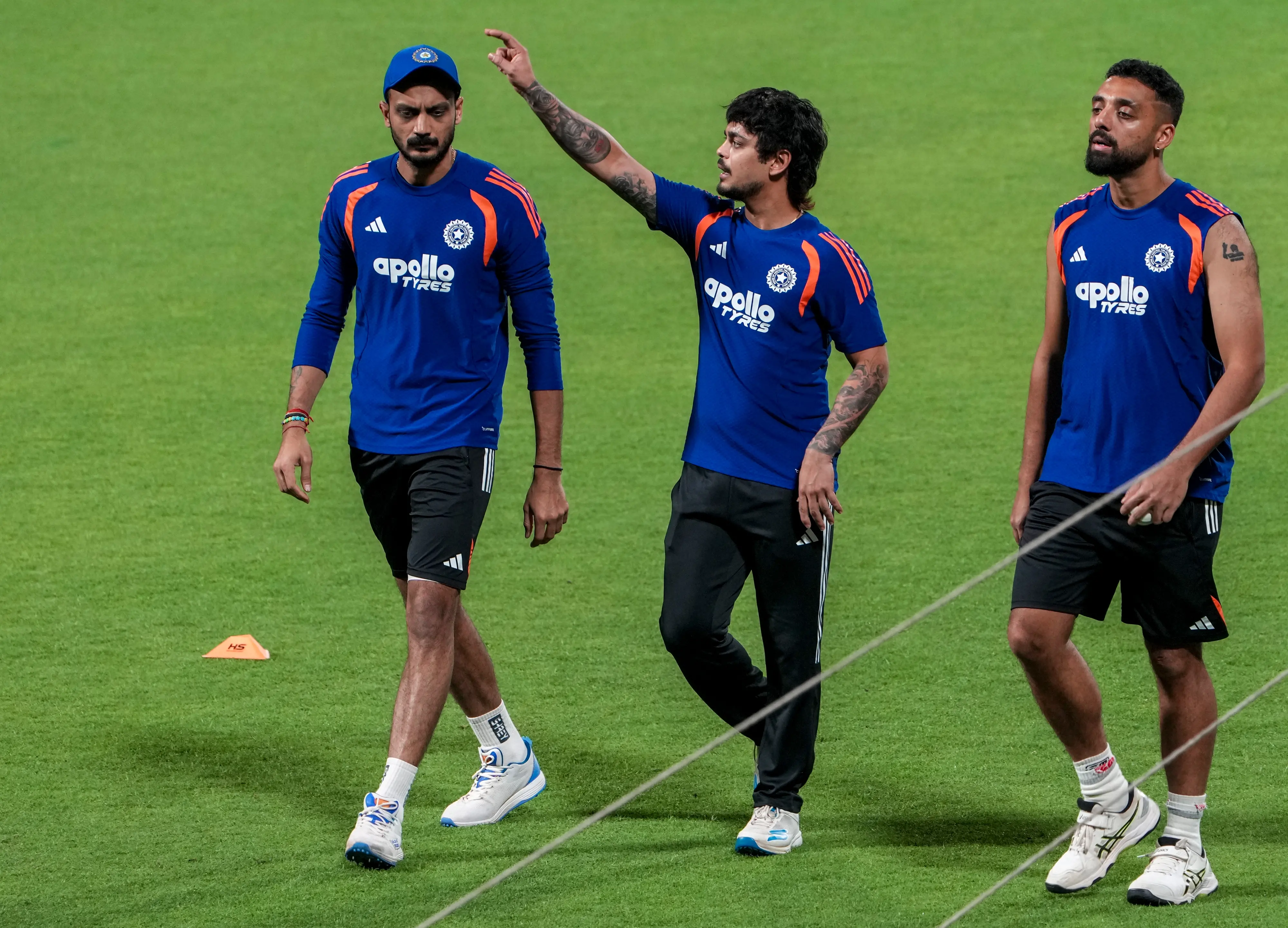 From left, India's Axar Patel, Ishan Kishan and Varun Chakravarthy during a practice session | PTI