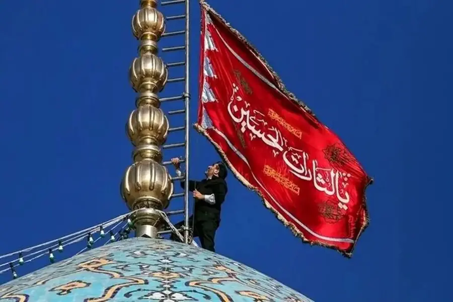 The red flag of vengeance flying atop the minaret of Jamkaran Mosque in Qom Iran