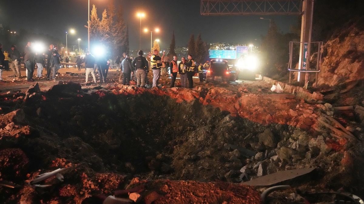 Iran missile barrage injures three in Jerusalem, highway hit