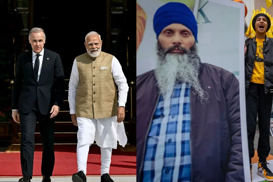 India's Prime Minister Narendra Modi (R) walks with his Canadian counterpart Mark Carney