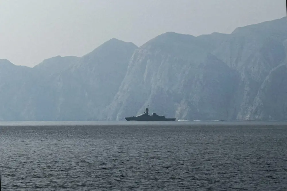 A navy vessel is seen sailing in the Strait of Hormuz | AFP