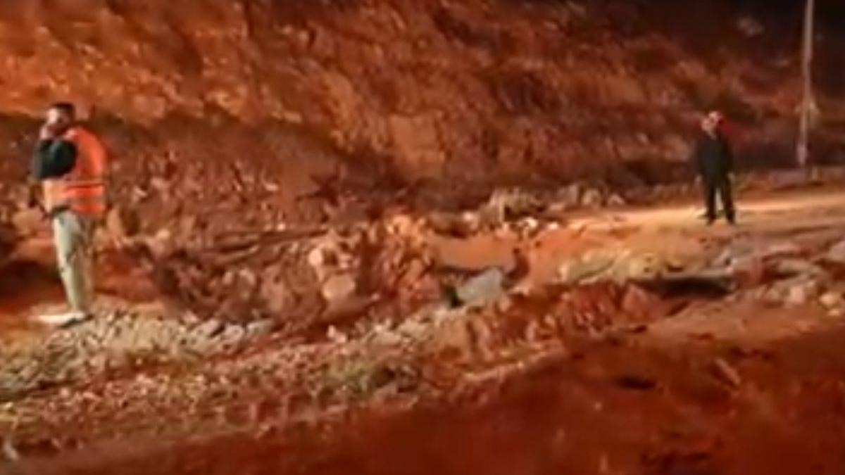 Jerusalem missile strike: Crews fill blast crater after...