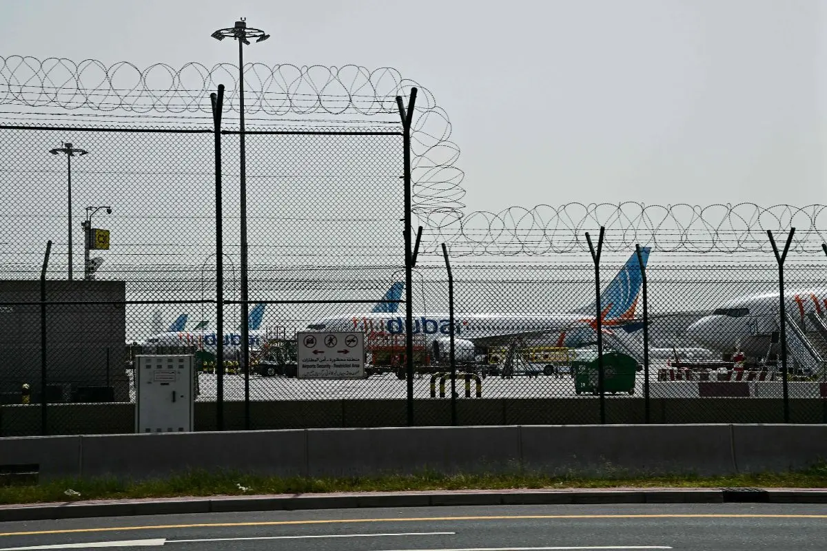 FlyDubai planes are parked on the tarmac at Dubai International Airport as Iran retaliates following the US and Israel's assassination of its supreme leader, in Dubai on March 2, 2026 (Photo: AFP)