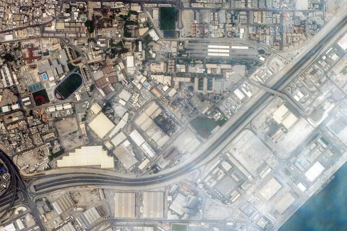 This handout satellite image taken by 2026 Planet Labs PBC on March 1, 2026 shows a view of smoke rising from damage at the US Fifth fleet naval base in Bahrain's capital Manama after it was hit by Iranian strikes. | Photo: AFP