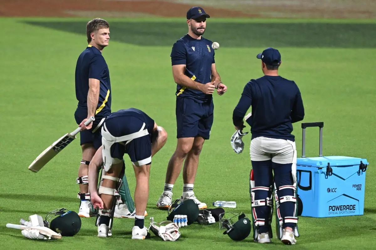South Africa's captain Aiden Markram (C) tosses the ball during a training session on the eve of their 2026 ICC Men's T20 Cricket World Cup semi final match against New Zealand at the Eden Gardens in Kolkata. | Photo: AFP