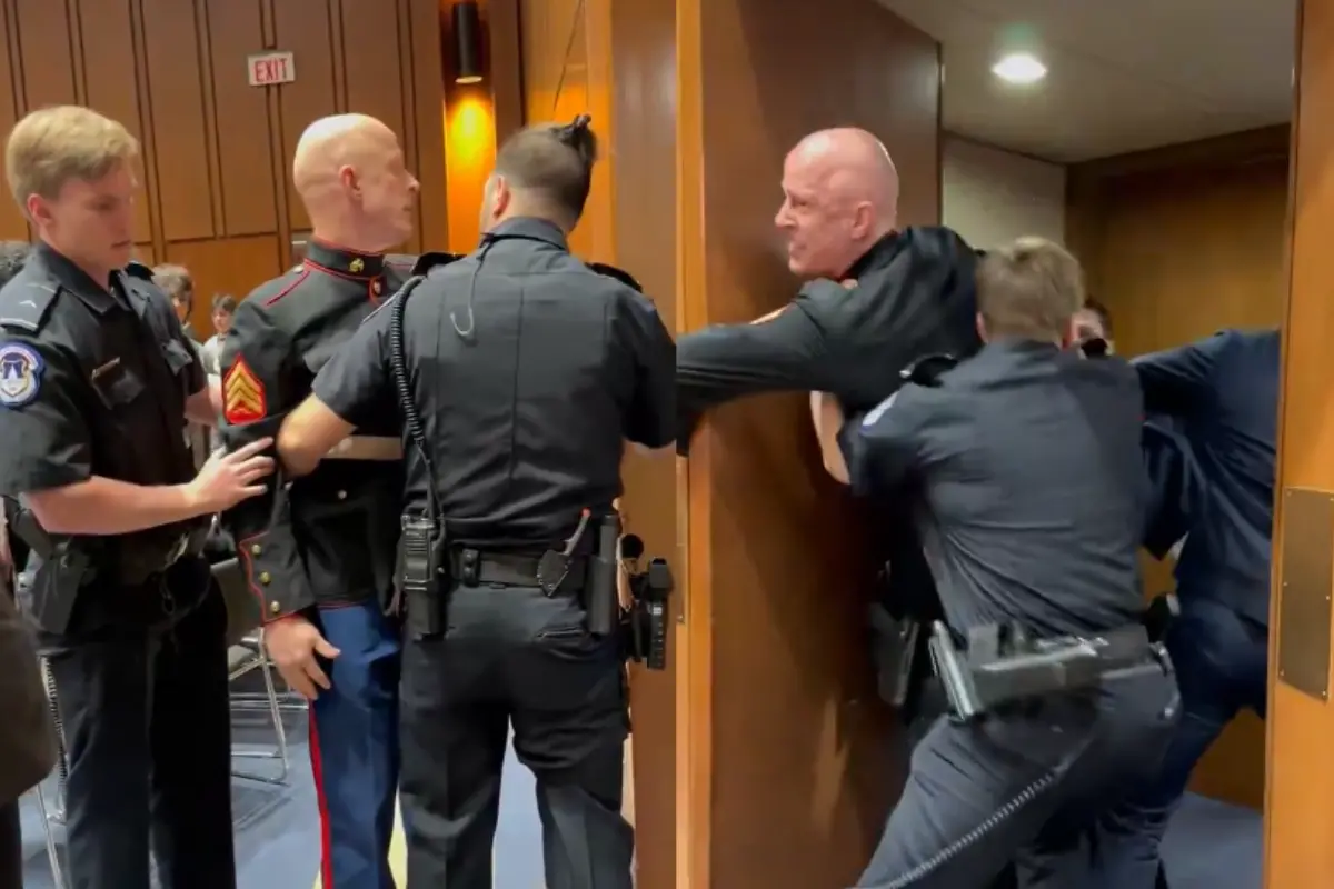 Brian C. McGinnis protesting