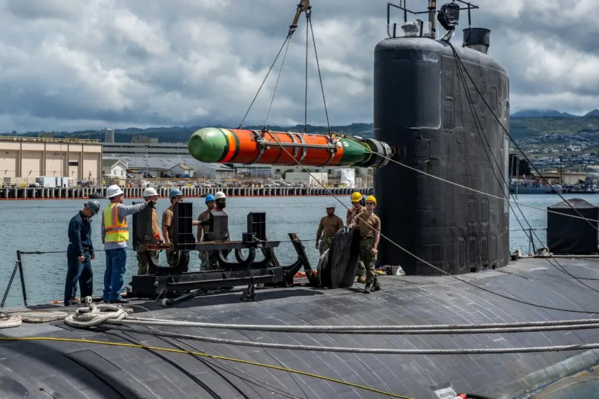 Sailors assigned to USS Columbia (SSN 771) load a Mark 48 advanced capability torpedo | Photo: @USNavy on X