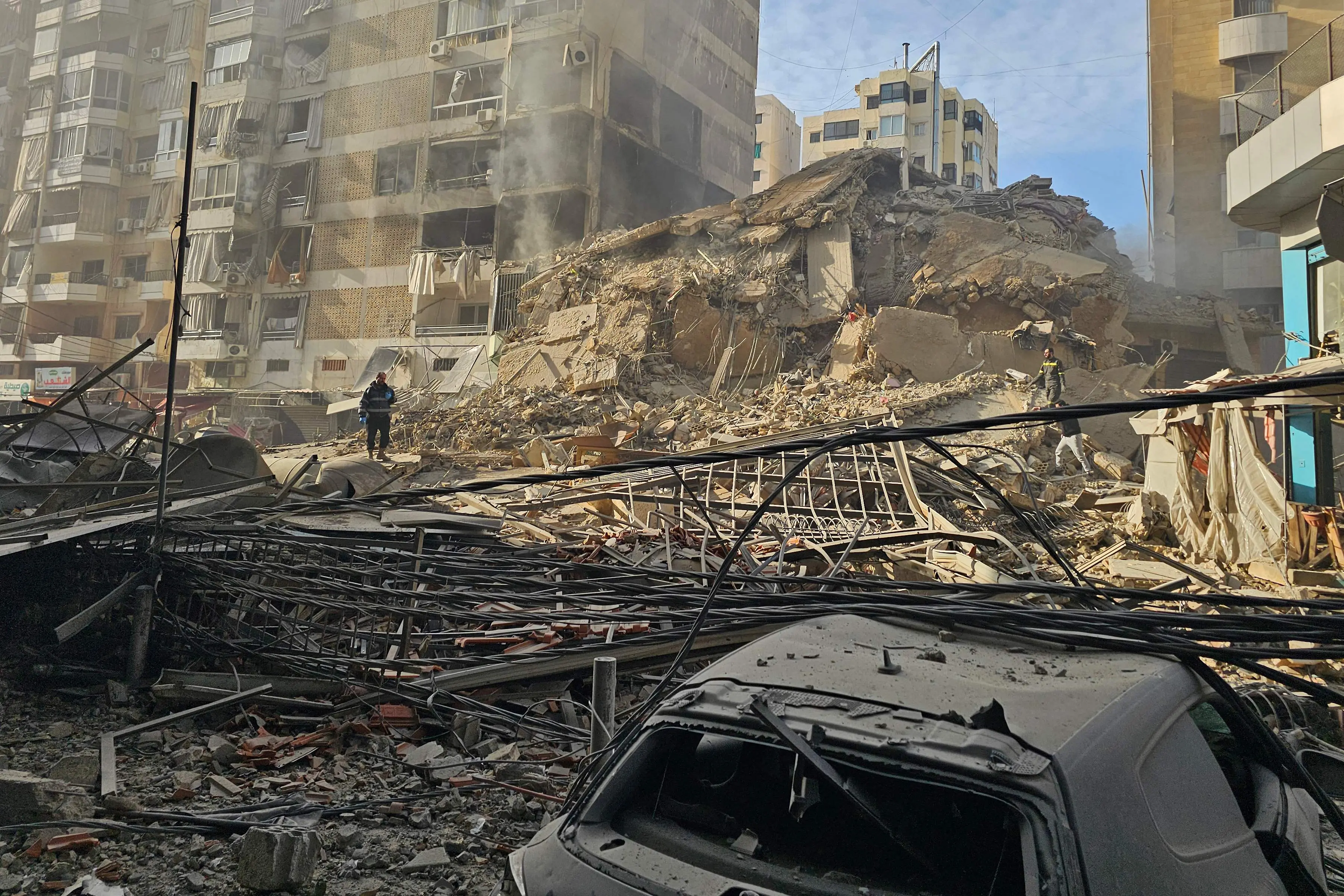 A man inspects destruction at the site of an Israeli airstrike that targeted Mar Mikhael neighbourhood in Beirut's southern suburbs | AFP