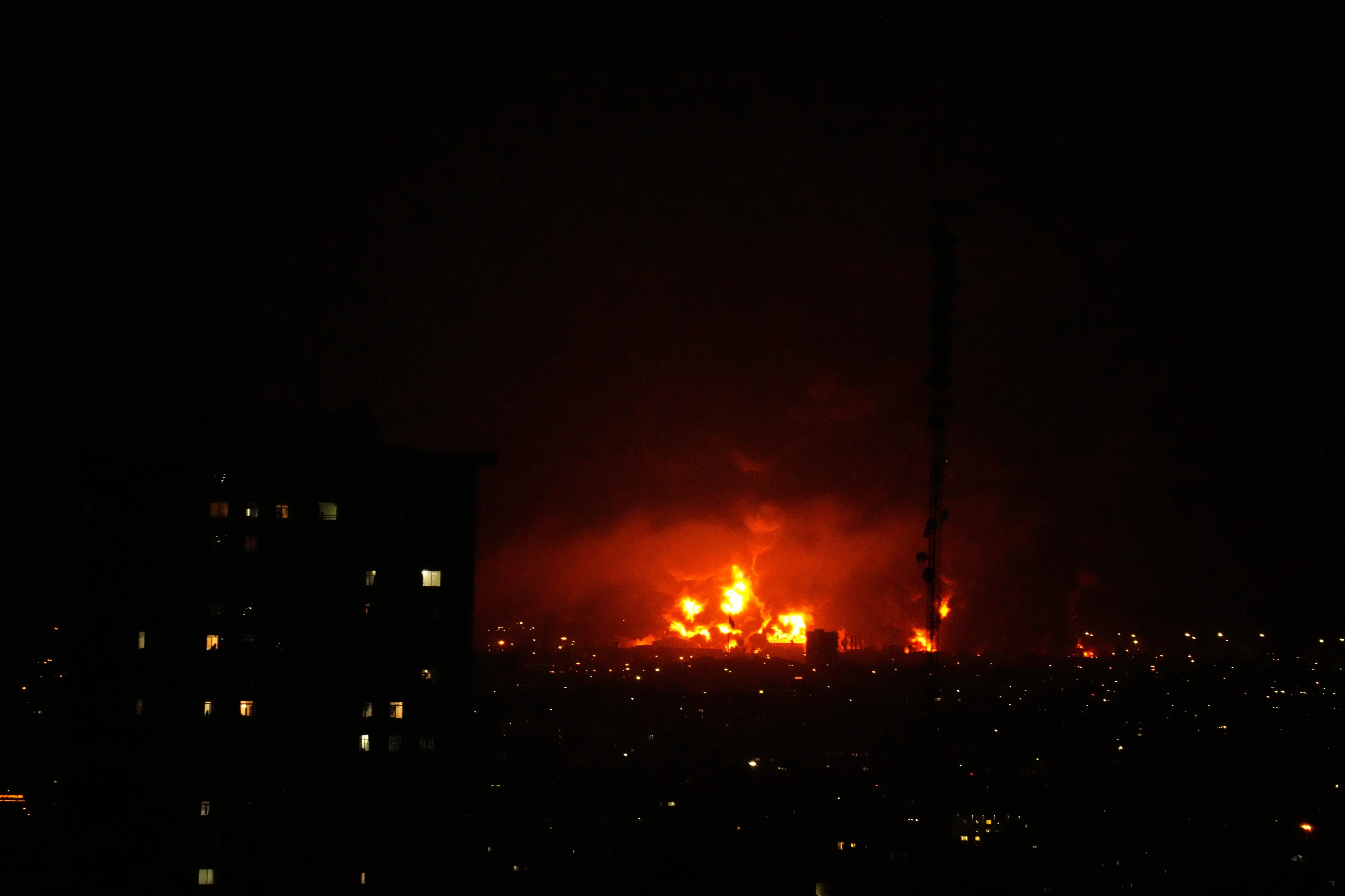 Flames rise from an oil storage facility south of the capital Tehran | Photo: AP