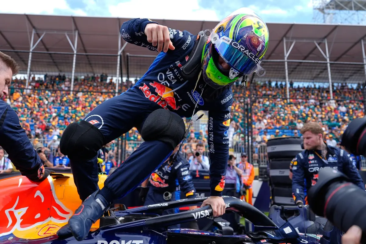 Red Bull driver Isack Hadjar of France gets out of his car on the start grid prior to the start of the Australian Formula One Grand Prix at Albert Park, in Melbourne, Australia.| Photo: AP