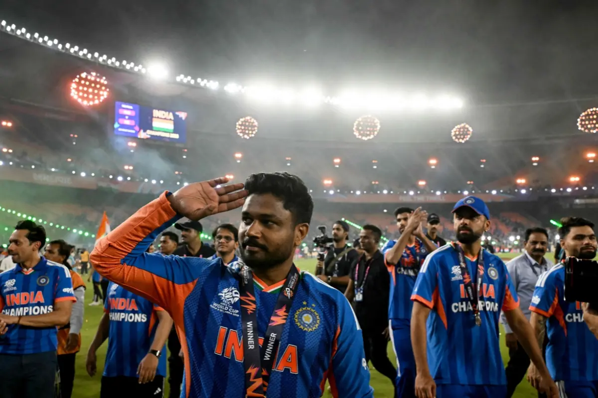 Sanju Samson with teammates greets fans during a victory lap after winning the 2026 ICC Men's T20 Cricket World Cup final | Photo: AFP