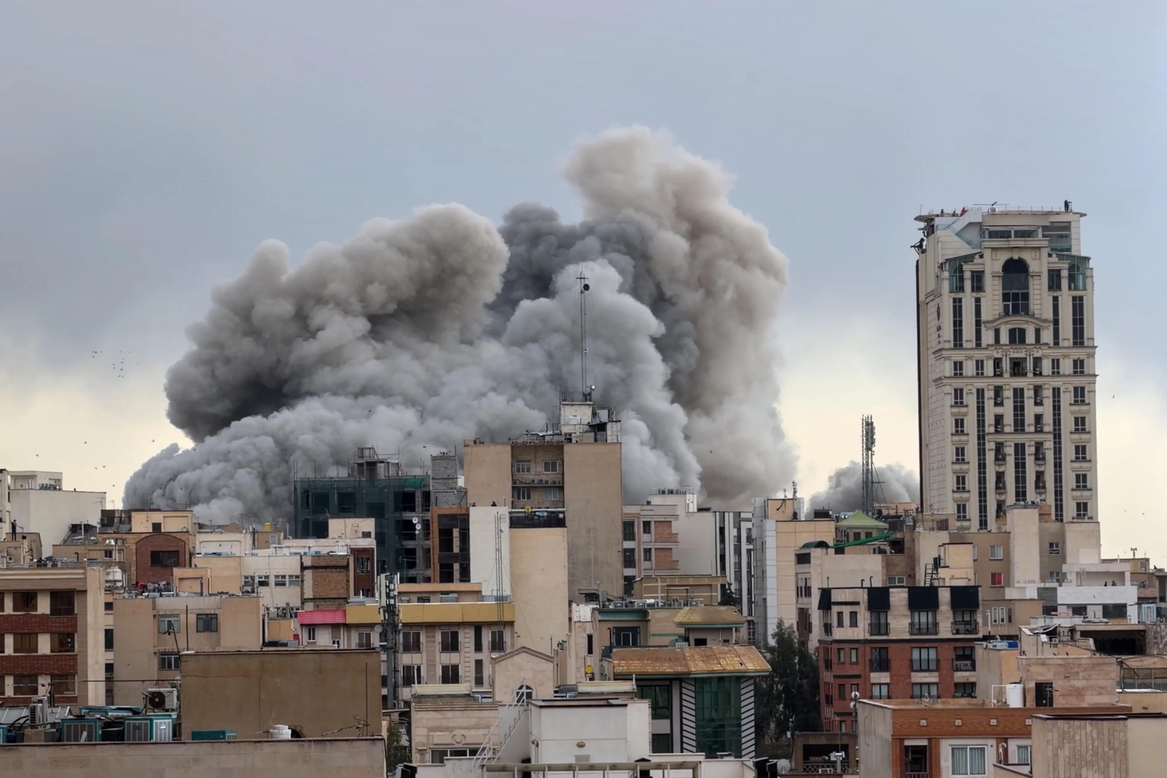 A plume of smoke rises after a strike in Tehran | File photo: AP