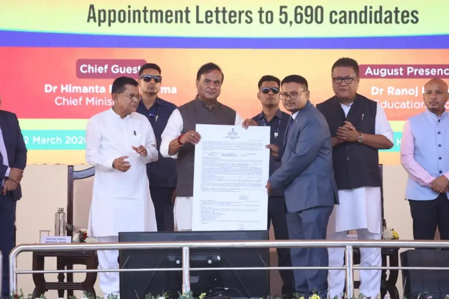 Assam CM Himanta Biswa Sarma distributing the appointment letters