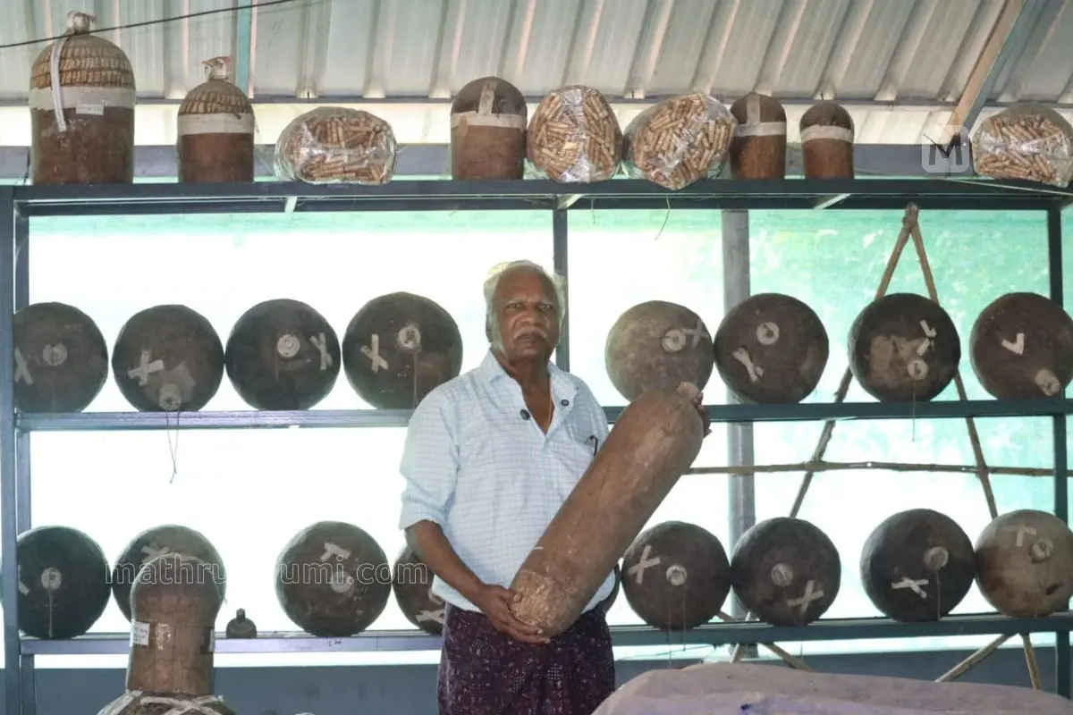 Francis Karekkatt showcasing a fireworks model intended for display