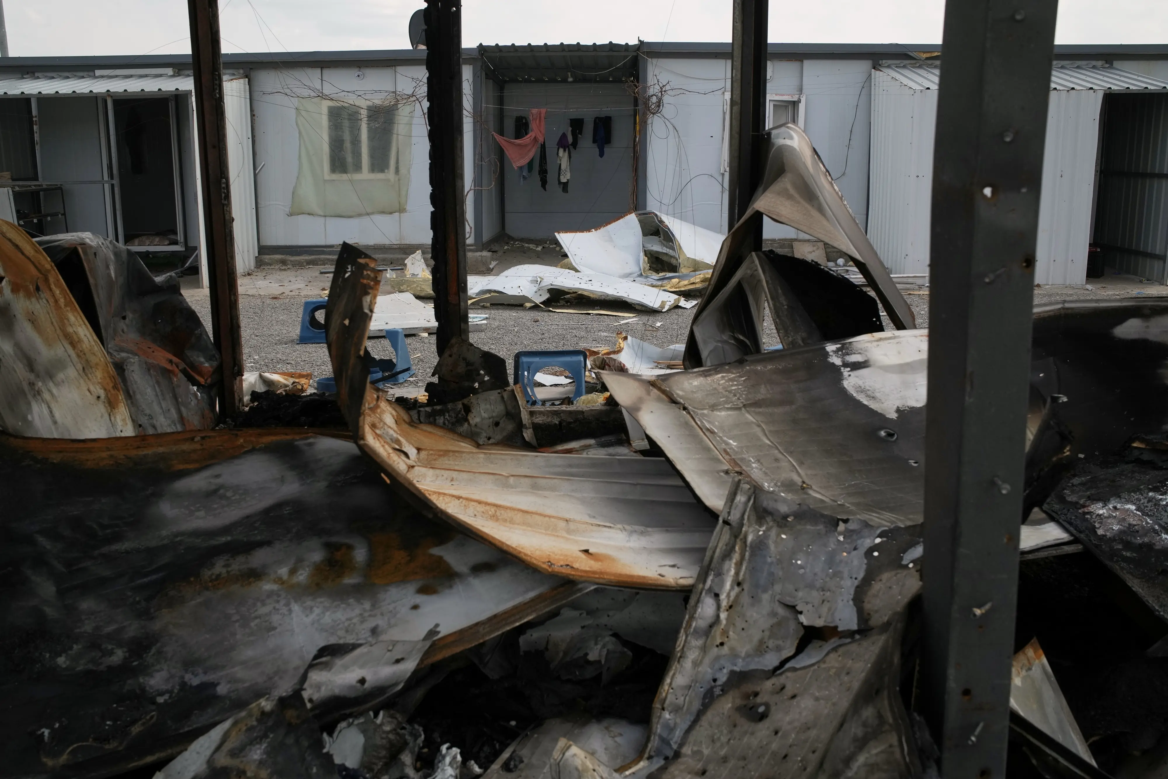 A military base of the Kurdish-Iranian opposition group Kurdistan Freedom Party (PAK) damaged in Iranian drone attacks last week is seen on the outskirts of Erbil, Iraq | Photo: AP