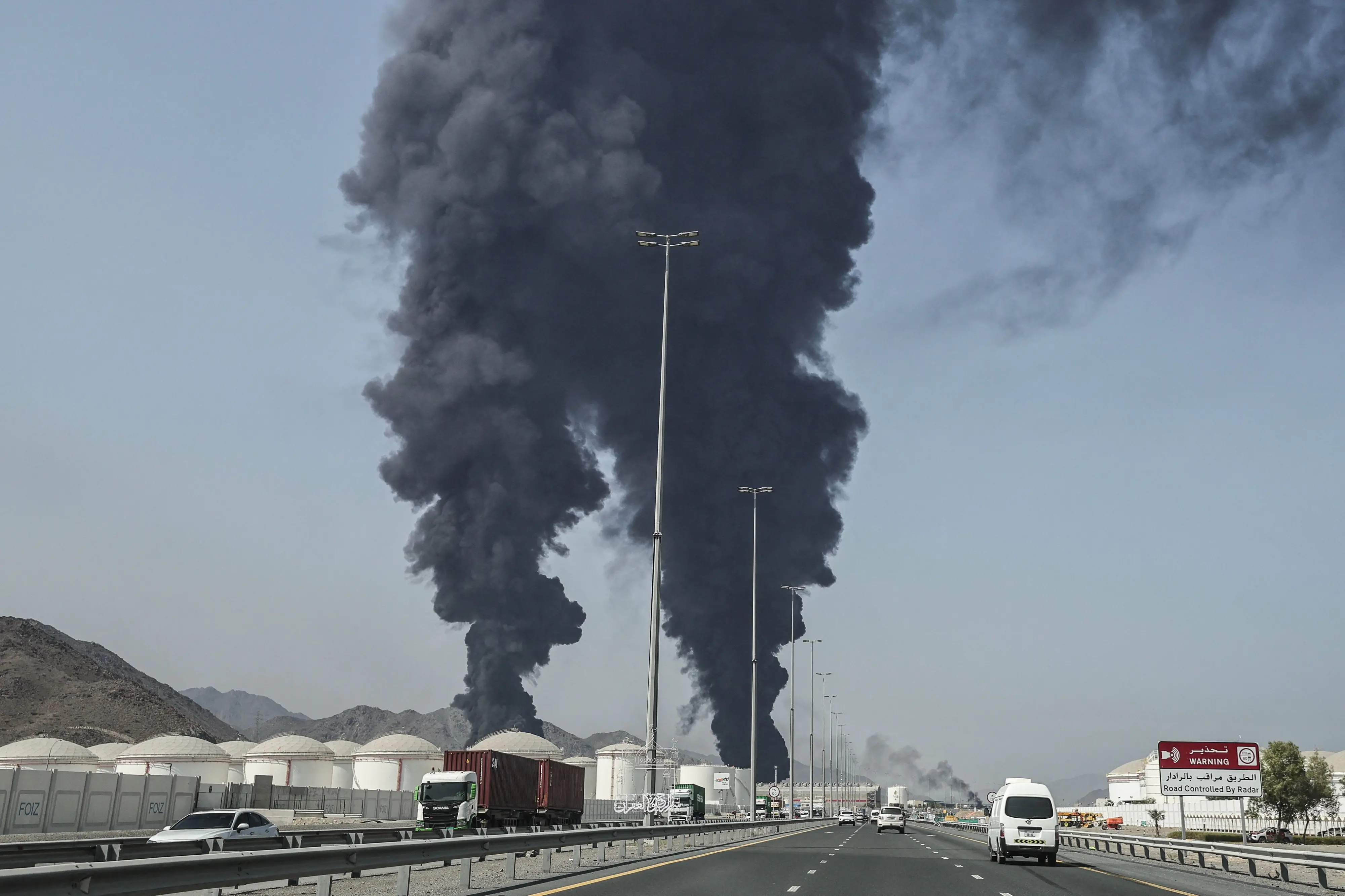 Smoke rises from the direction of an energy installation in the Gulf emirate of Fujairah | Photo: AFP